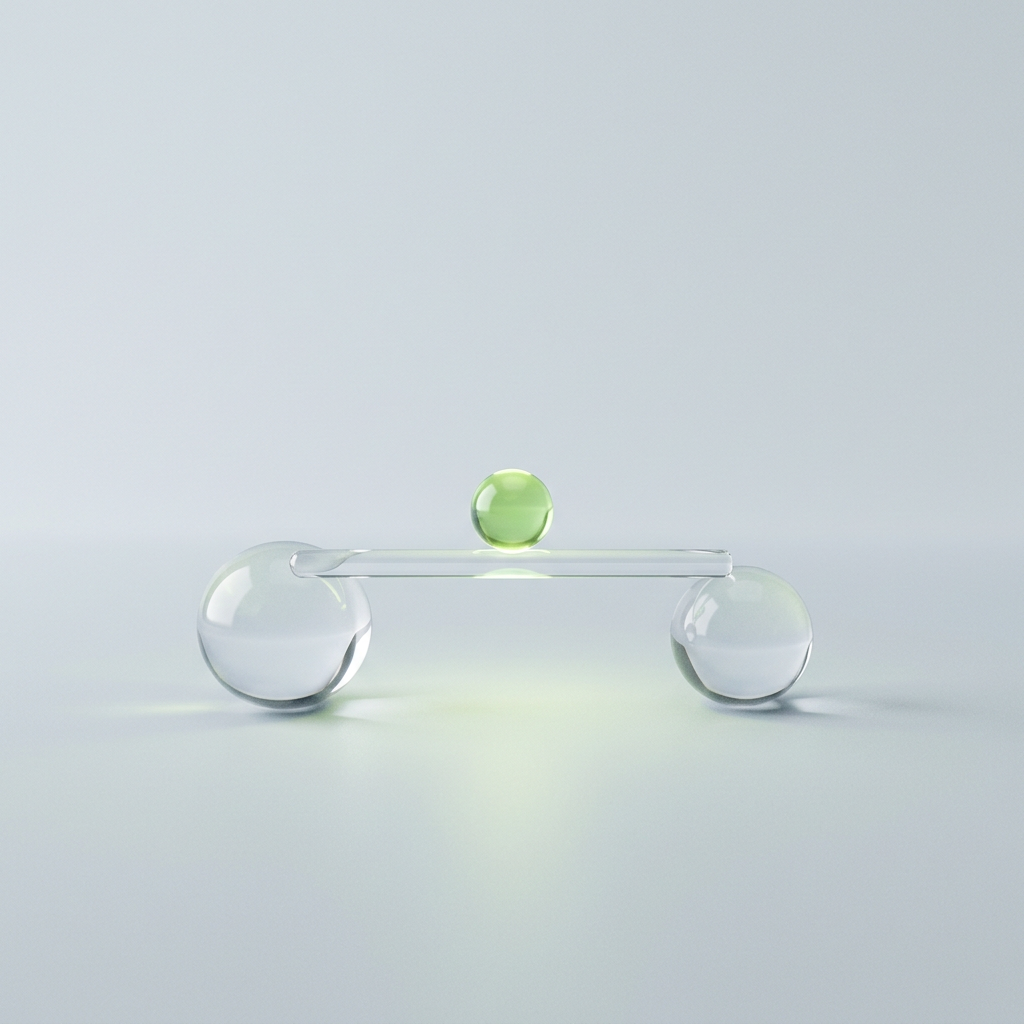 Two clear glass spheres of different sizes sit on a pale surface, linked by a short clear glass rail, with a small glowing green sphere on the rail between them.