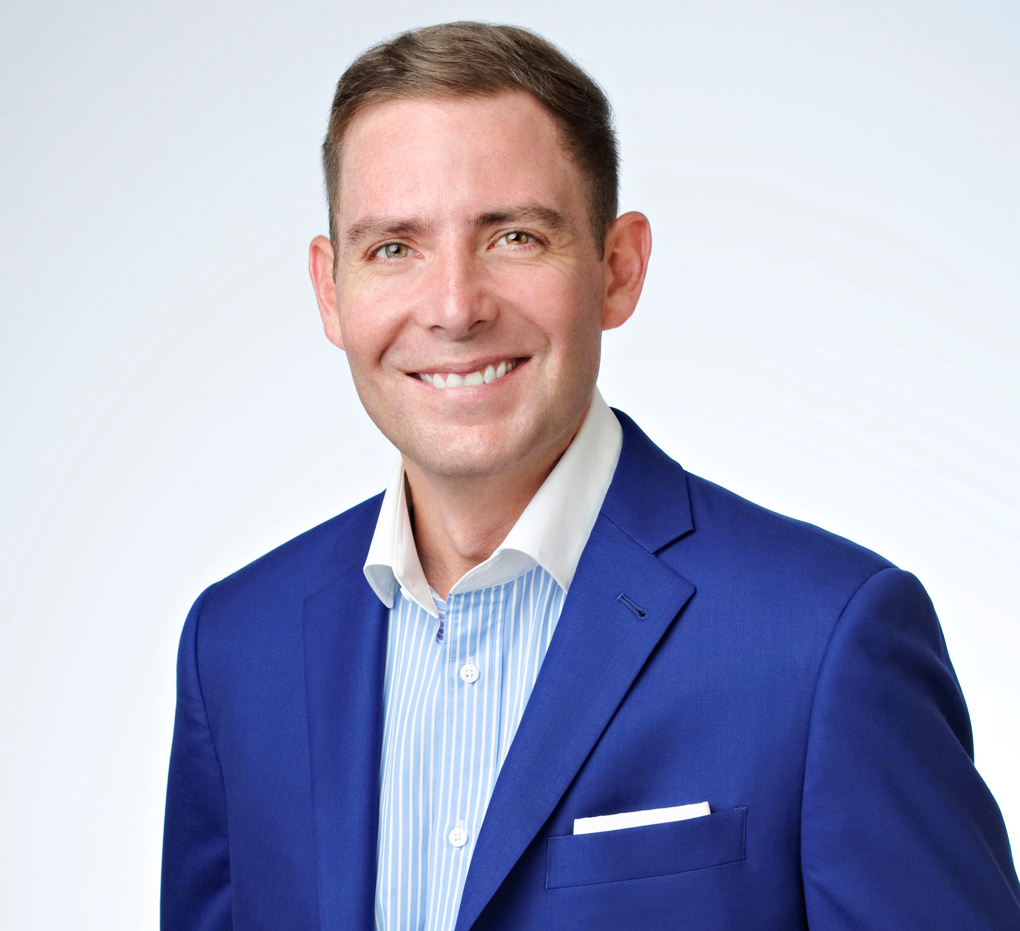 Bob Generale, President of Percepture and contributing B2B lead generation expert, wearing a blue suit.